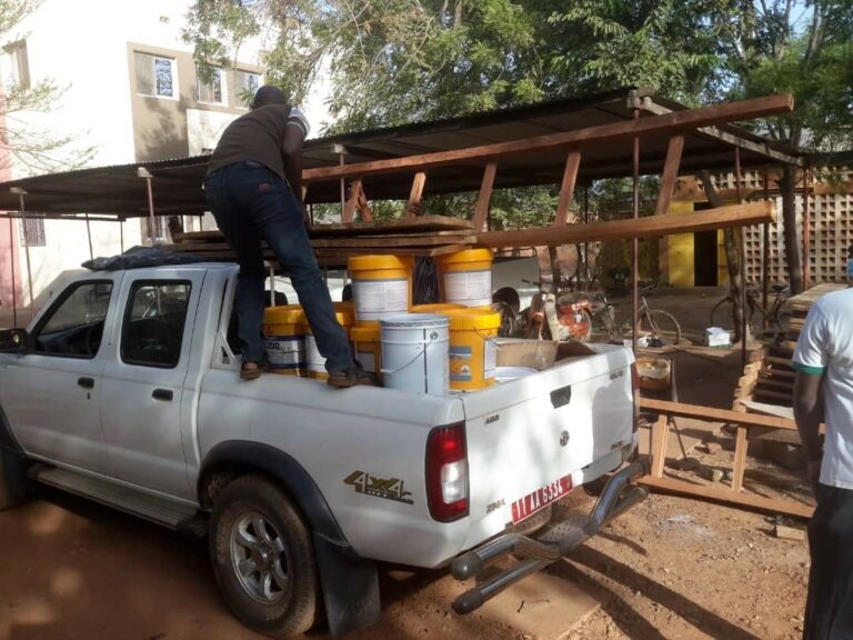 Transporting cool roof coatings to homes in the randomized controlled trial